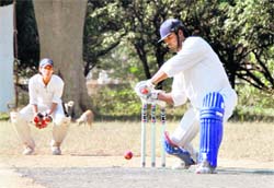 A batsman in action at the Beehive Challenger Trophy T20 Cricket Tournament in Dehradun on Wednesday. 