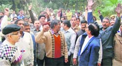 Employees of IIT Roorkee hold a demonstration in Roorkee on Wednesday. 