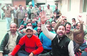 Employees of the BSNL hold a demonstration in Jammu on Wednesday.
