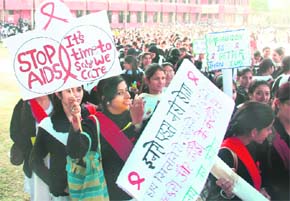 Students of Government College for Women, Parade, take part in an AIDS awareness rally in Jammu on Wednesday.