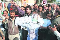Activists of the BJP hold a demonstration at Janipur in Jammu on Wednesday.