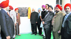 Justice RS Randhawa from the Punjab and Haryana High Court inaugurates a block at the GGNIMT in Ludhiana.