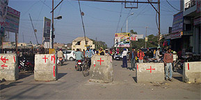 Barricades laid by the administration near SDM court road rail crossing to regulate traffic. Photo by writer