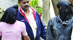 Two of the five accused arrested for allegedly raping the BPO employee being taken to a court in New Delhi