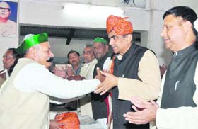 BJP Kisan Morcha chief Om Prakash Dankhar being felicitated at a function in Dehradun