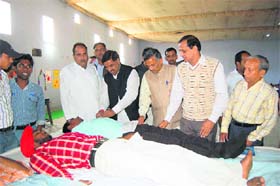 Jai Bhagwan Sharma, Kurukshetra District Congress Committee president, interacts with students at a blood donation camp organised by IGN College, Ladwa, on November 19