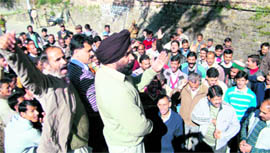Workers of the BSNL hold a protest against the proposed disinvestment of the BSNL in Shimla on Thursday.