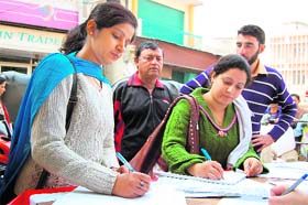Members of the Jammu and Kashmir Physiotherapists Association hold a signature campaign in Jammu on Thursday.
