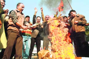 BJP activists hold a demonstration at Gandhi Nagar in Jammu on Thursday.