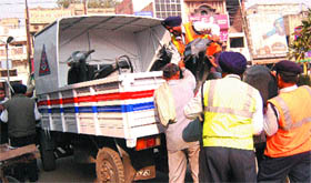 Traffic policemen seize vehicles parked in no-parking zone at Milap Chowk in Jalandhar.