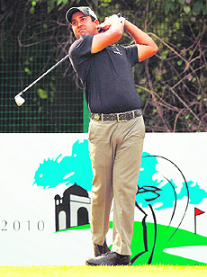 Shiv Kapur in action on day one of the Hero Honda Indian Open golf tournament at the Delhi Golf Club in New Delhi on Thursday.  AFP