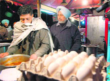 ADC PS Shergill inspects a stall at the Night Food Street in Chandigarh on Friday