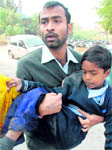 The mangled remains of a demo Maruti Suzuki SX4 car after it hit cars parked outside an automobile showroom in Industrial Area, Phase I; people lift a damaged Alto car to pull out 10-year-old schoolboy Suraj, who was trapped following the accident; and the injured boy being taken to the hospital in Chandigarh on Friday