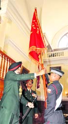 Lt Gen RS Sujlana, Commandant, IMA, present colours to the Bogra Company for standing first in the Army Cadet College at the graduation ceremony held at IMA, Dehradun, on Friday.