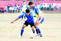 A match of the Sub-Junior Mir Iqbal Hussain Inter-School Coca Cola Football Championship in progress in Dehradun on Friday.