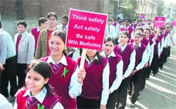 Students participate in a rally in Dehradun on Friday. 