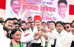 Youth Congress workers present a sword to the AICC secretary and MP Bhanwar Jitender Singh at Sirsa on Friday. Sirsa MP Ashok Tanwar also seen in picture.