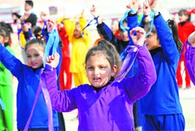 Students of Saint Peter High School perform during the celebrations of the annual Sports Day at MA Stadium in Jammu on Friday.