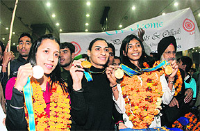 Mandeep Kaur (left), Manjit Kaur (centre) and A C Ashwini, along with Sini Jose (not in picture), won the gold in 4x400m relay. Ashwini also got the gold in 400m women’s hurdles.