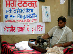 Labh Singh, who is physically challenged, at work in Jaipalgarh village, the venue of Virasat Mela, in Bathinda on Saturday