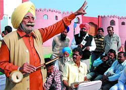 Folk singer Gurpal Singh regales spectators during the ongoing Virasat Mela at Jaipalgarh village in Bathinda on Saturday