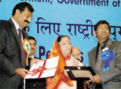 The national award for the best local-level committee of the National Trust was received by Dr S. Karuna Raju, IAS, DC-cum-Chairman (Faridkot) from the President of India Pratibha Devisingh Patil in the presence of Union Minister D. Napoleon and Mukul Wasnik, Union Minister for Social Justice and Empowerment at the Vigyan Bhawan in New Delhi on Friday, the International Day for Disabled Persons