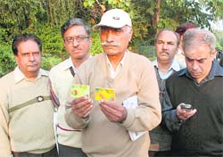 Victims of ATM card cloning at Panchkula on Saturday. 