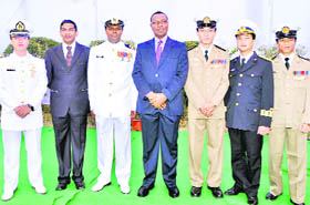 Naval officers from friendly countries, who are being trained in cartography at the Naval Hydrographic Office, pose during the Navy Day celebrations in Dehradun on Saturday.