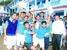 The Dolphin B team that won the title in the boys category of the volleyball competition in Dehradun on Saturday.