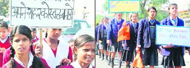 Students of government (left) and private schools participate in an anti-polythene rally in Haridwar on Saturday.