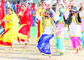 Kids present an item on the concluding day of a sports meet for hearing and speech impaired children in Karnal