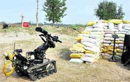 A 3-foot-long remotely operated vehicle (ROV), imported from the UK, which can be operated from a distance of around 1 km and is equipped with a gun on top, is being used to destroy small scrap bombs in the ongoing detonation exercise by the Army in the Mattewara forest area