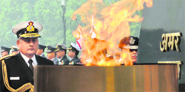 Navy chief Admiral Nirmal Verma pays homage at the Amar Jawan Jyoti on the occasion of Navy Day, at India Gate in New Delhi