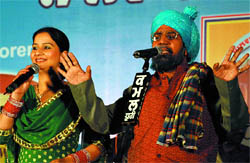 Comedian Gurdev Dhillon alias Bhajna Amli (right) along with Suman Santi entertain the viewers on the concluding day of the Virasat Mela that was organised at the Sports Stadium in Bathinda on Sunday