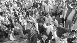 PGI attendants protest in support of their demands at the rally ground in Sector 25, Chandigarh, on Sunday.