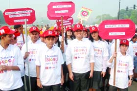 Schoolchildren take part in Walk for Blood rally at Rajpath in New Delhi