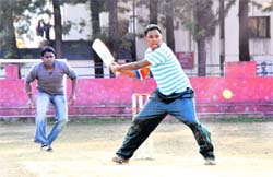 A player in action at the Inter-Personnel Cosco Ball Cricket Tournament in Dehradun on Sunday.