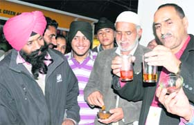 Saffron growers from J&K show difference between original and adulterated stuff on the concluding day of Agro Tech 2010 in Chandigarh on Monday. 