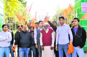 Bajrang Dal activists hold a march to mark the anniversary of Babri Mosque Demolition at Gandhi Park in Dehradun