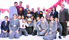 Justice Rajesh Bindal of the Punjab and Haryana High Court with the winners of the annual sports meet held at DAV Centenary Public School, Pehowa, on Sunday.