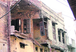 A three-storeyed dilapidated and unsafe building at Chhawni Mohalla in old city of Ludhiana.