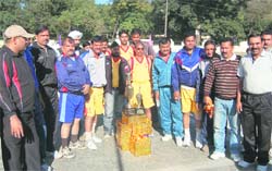 Members of the winning and runners-up teams in the Ordinance Factories North Zone Basketball Championship held in Dehradun on Monday.