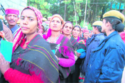 Residents of Chhotta Banghal village visit the Vidhan Sabha in Dharamsala on Tuesday to meet the Chief Minister.
