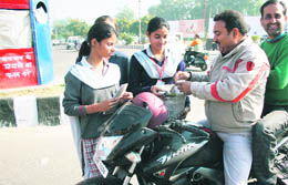 Students of Dogra Higher Secondary School collect funds on Armed Forces Flag Day in Jammu on Tuesday