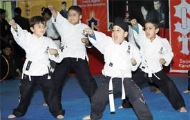 Students display their karate skills at the award ceremony held at Sanjay Karate School in Jalandhar.