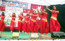 Students of DIPS, Nurmahal, give a performance during the schools annual prize distribution function.