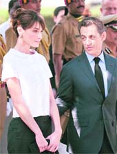 French President Nicolas Sarkozy and his wife Carla Bruni-Sarkozy participate in a ceremony commemorating the November 2008 terror attacks, in Mumbai on Tuesday. 