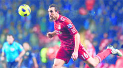 Liverpools Sotirios Kyrgiakos controls the ball during their match against Aston Villa at Anfield on Monday. Liverpool beat Villa 3-0.
