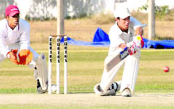 A batsman plays a shot during a match of the Leslie Gordon Carver U-17 Inter-Academy Cricket Tournament at DAV School, Sector 8, in Chandigarh on Wednesday