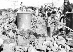 Debris being removed from the demolition site at Phase I, Mohali, on Wednesday